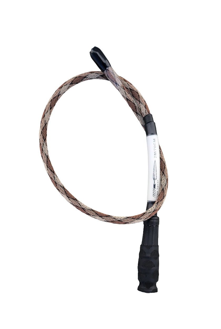 The flexible Maximus Antenna from Iron Spear Outfitters bent in a curve, demonstrating its Nickel Titanium durability for 2m/70cm radios