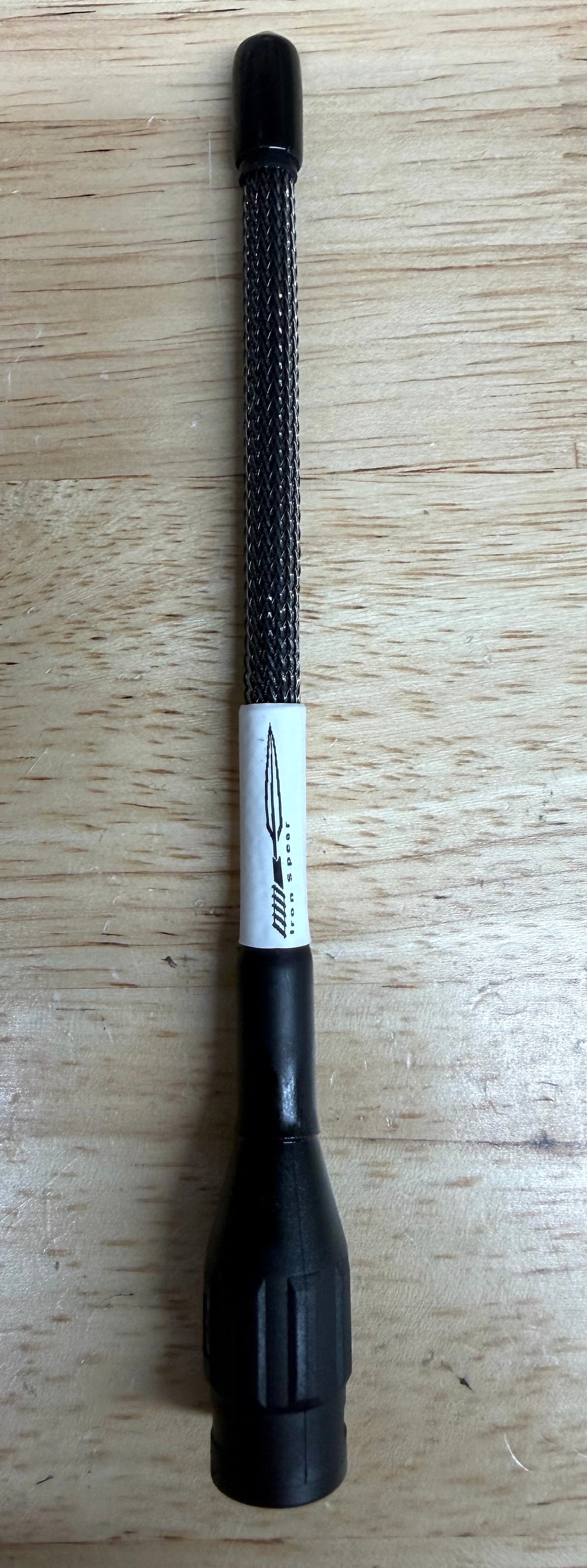 Minimus antenna Black on wood.