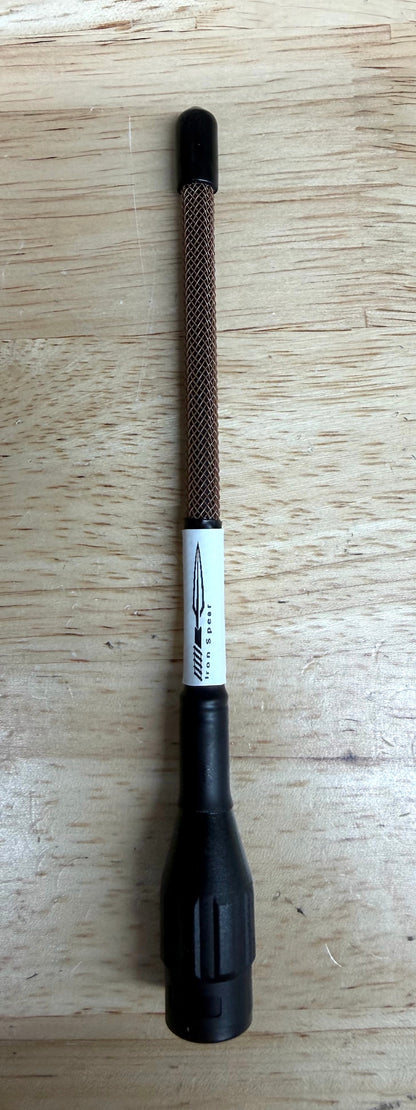 Minimus antenna Brown on wood.